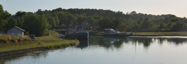 Canal boat  in France at the berth in evening by boating holidays