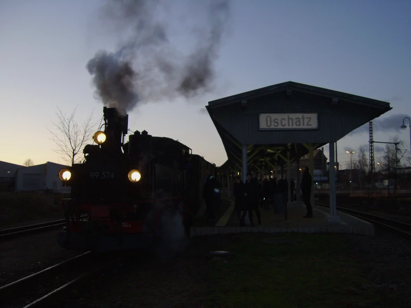 Nightly departure of a narrow gauge steam train at Oschatz station destination Mügeln