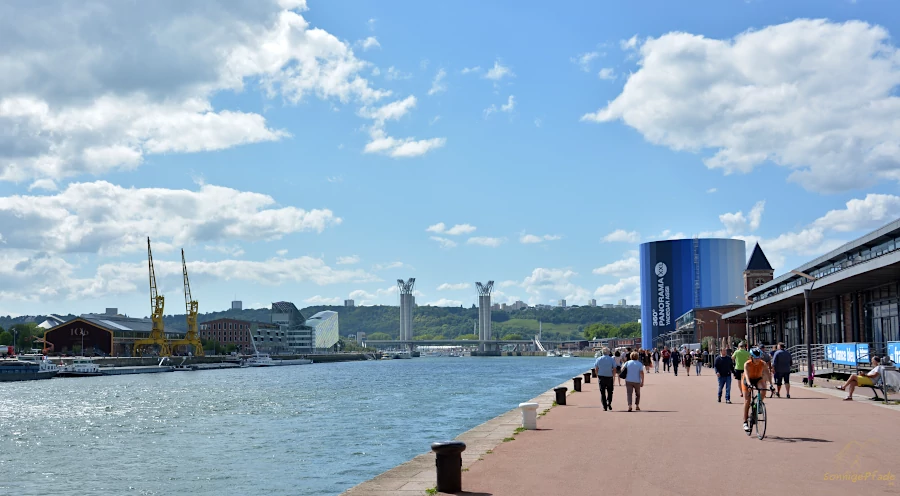 At the harbor promenade in Rouen with view to the lift bridge "Gustave Flaubert" and the Assisi panorama rotunda