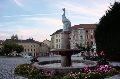 Fountain near the Meissen Old town bridge with Helmet cassowary in Porcelaine