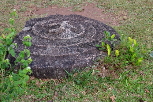 Human figure? A lid with figure in jar site 1, plain of jars
