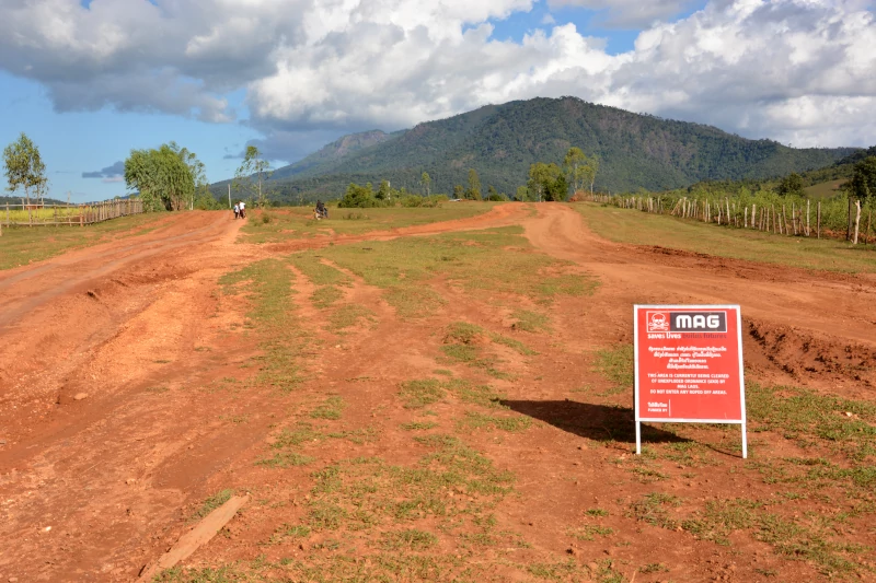 Warning against cluster bombs - MAG Laos in  Xieng Khouang Province