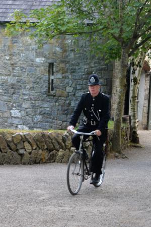 Irish police man  - Garda with bicycle