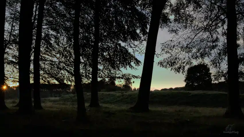 Sunset over the middle age ramparts of Magelund voldsted castle at Funen island in Denmark