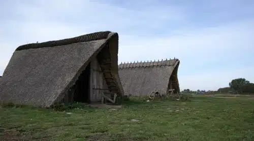 Viking pit houses in the growing Royal court, outdoor area of the Ladby Viking museum at Funen island, Denmark